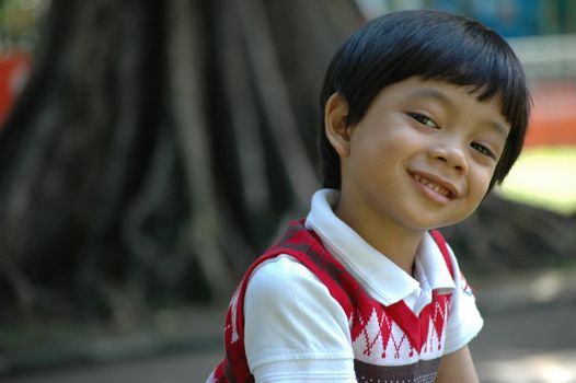 little boy with nice and cute face expression