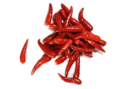 Heap of spicy red chili pepper isolated on white