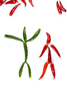 couple of funny chilli people isolated on white