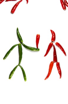 couple of funny chilli people isolated on white