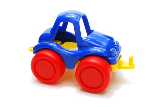 Small Color Plastic Car Toy Isolated on White with Shadow