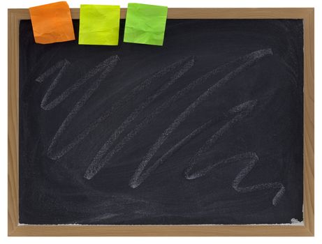 blank blackboard with white chalk scribble and three color sticky notes on wooden frame, isolated on white