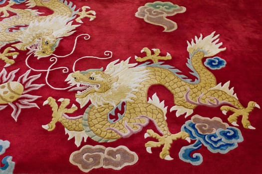 Dragon image on the carpet in chinese temple, Thailand.