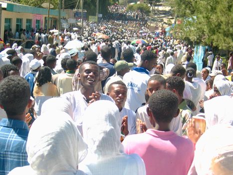 A large crowd accompanying a Tabot (model of the arc of covenant) of St Michael church during Timket (baptism in Amharic) celebrations - The baptism of Jesus (Taken on January 21, 2008)