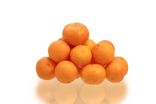 Stack of tangerines isolated on wite background with clipping path