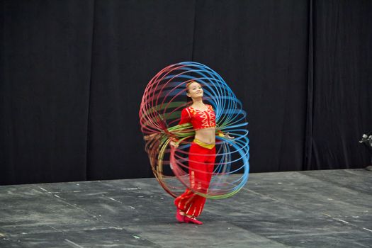 A young chinese girl performing at the Chinese Acrobat show