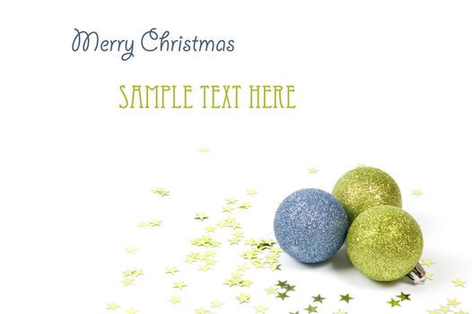 colorful christmas balls with green stars isolated on white