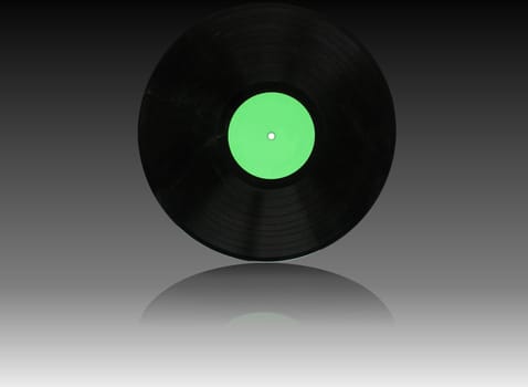 Vinyl record vintage analog music recording medium reflected on glass surface