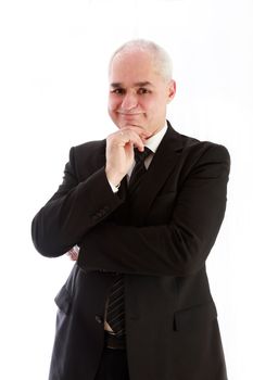 A friendly, elderly man smiling in a suit with gray hair