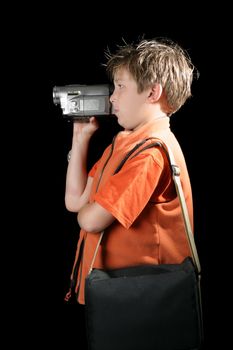 A child using a digital video camera to record a home movie.