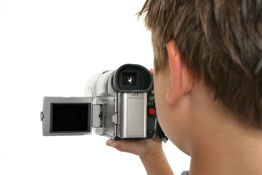 Watching a video playback on the camera lcd screen.  Focus on video camera.    Screen left blank to add your movie, picture or message if desired.
