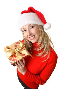 Friendly, smiling woman in red holding a red and gold present tied up with a golden satin bow.