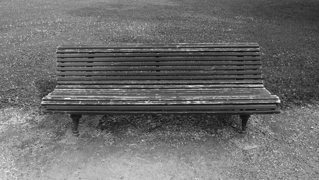 Detail of wooden bench in a park