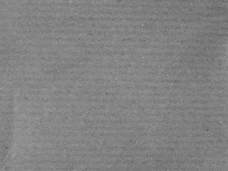 Brown corrugated cardboard sheet useful as a background