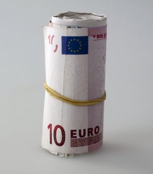 Euros roll over gray background, fixed with rubberband