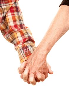 Senior couple holding hands on white bakcground