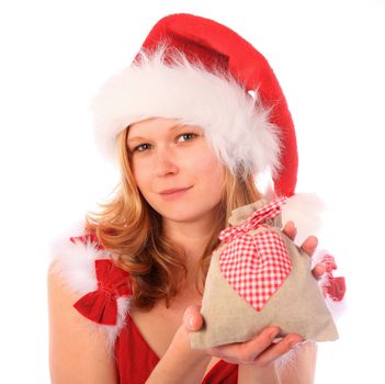 Miss Santa is holding a little fancy gift bag with a red heart on it