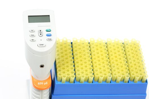 850ul 12 way pipettor and racks of pipette tips. Multichannel pipettes allow you to utilize the power of electronic pipetting in microplate form.  It feature step-based programming that allows pipetting routines that would either be cumbersome or even impossible with manual pipettors