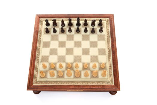 Above view of chess game board and playing pieces