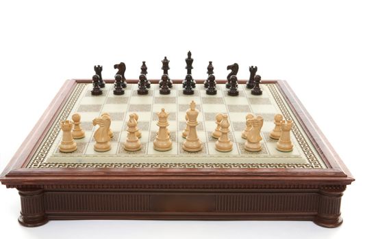 The game of chess is played on a square board consisting of 64 squares of alternating light and dark squares in a grid or checkerboard  pattern, with white pieces at bottomr and black pieces at the top