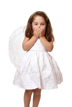 Little angel or fairy girl giggling with two hands covering her mouth