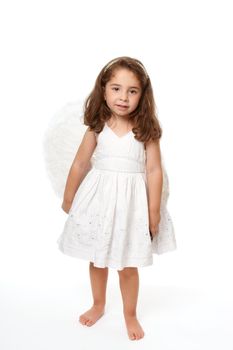 Divine little angel standing on a white background.