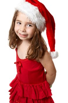 Little girl wearing a red dress and a red santa hat