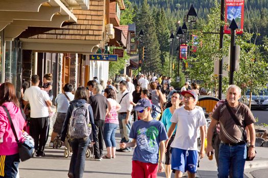 Tourists walking around in the town of Banff