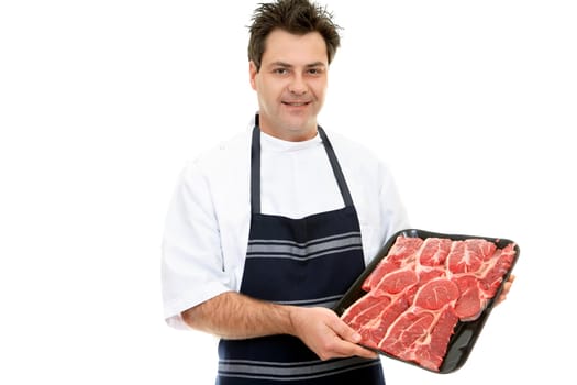 A butcher shows a tray of beef steak.