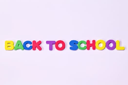 colorful letters with "BACK TO SCHOOL" isolated on white background