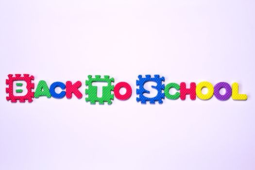 colorful letters with "BACK TO SCHOOL" isolated on white background