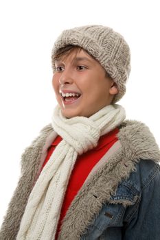 Happy laughing  boy dressed in coat and scarf for winter.