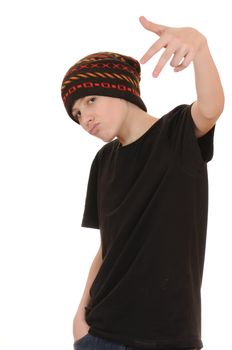 The teenager in a black vest and a hat isolated on white background