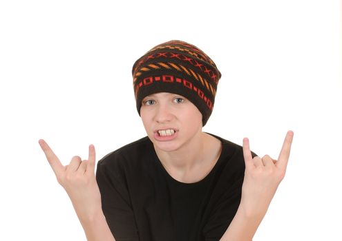 The teenager in a black vest and a hat isolated on white background