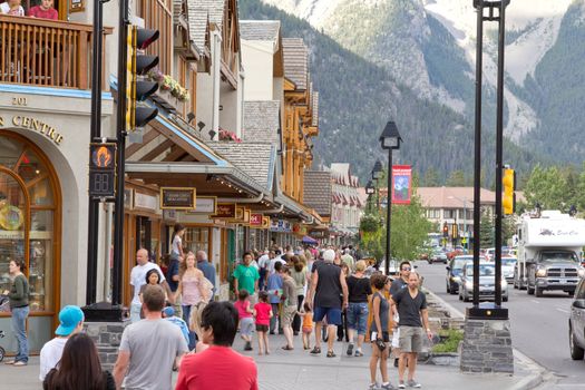 Tourists walking around in the town of Banff