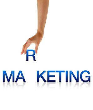 High resolution graphic of a hand holding the letter R of the word marketing. 