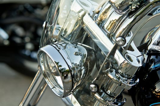 Headlights of a shiny motorcycle