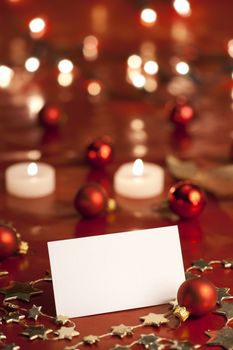 Christmas decoration with blank card. Selective focus, aRGB.