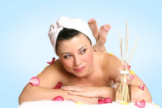 A resting woman ready for beauty therapy, massage or aromatherapy treatment