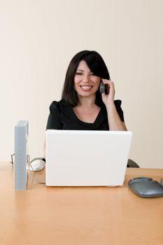 Emerging technologies - a woman using voip technology to make an internet phone call.
