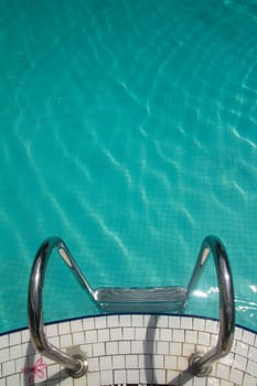Stainless steel railing in a swimming pool