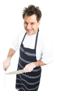 A friendly butcher or chef sharpens a knife.