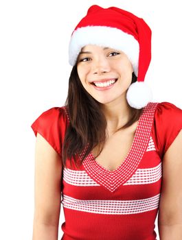 Santa girl. Cute shy smiling mixed asian / caucasian young woman with christmas hat. Isolated on seamless white background.