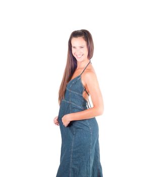 Beautiful  brunette woman in denim dress ion studio