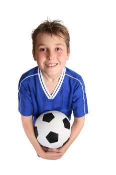 A young boy in soccer uniform ready to play soccer.