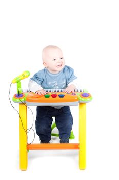 Studio shot of little boy, isolated on white