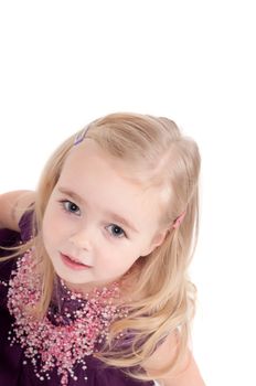 Studio shot of baby girl in lilac gala dress