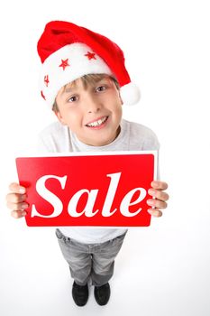 Full length standing boy holding a sale sign.  Suitable for pre and post Christmas sales.  Or add your own message.