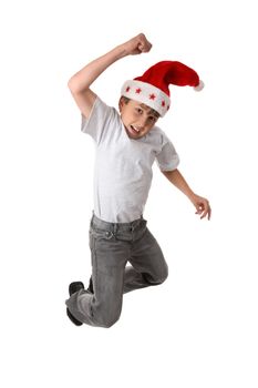 A smiling child leaps high into the air.  Slight motion in fingers.