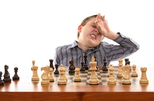 Chess player anguishes over bad move